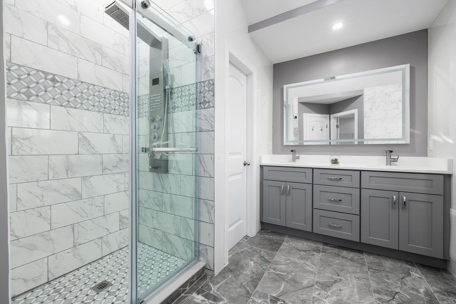 Completed bathroom with aligned wall, floor and shower tile